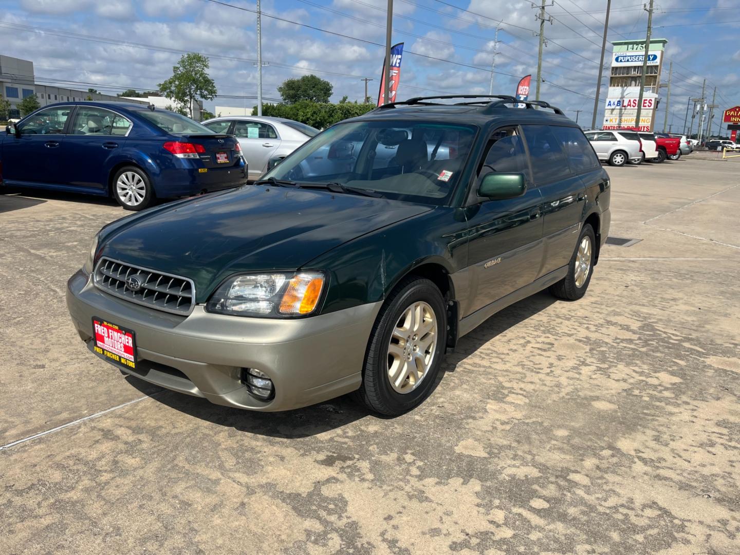 2003 green /TAN Subaru Outback Limited Wagon (4S3BH686737) with an 2.5L H4 SOHC 16V engine, 5-Speed Manual Overdrive transmission, located at 14700 Tomball Parkway 249, Houston, TX, 77086, (281) 444-2200, 29.928619, -95.504074 - Photo#2